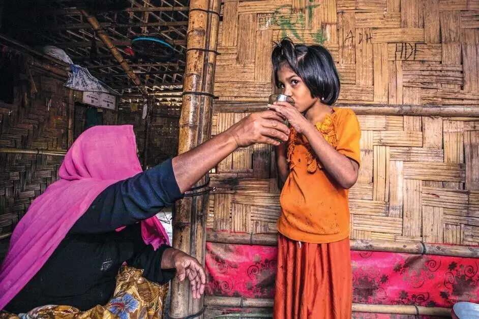 A girl drinking clean water